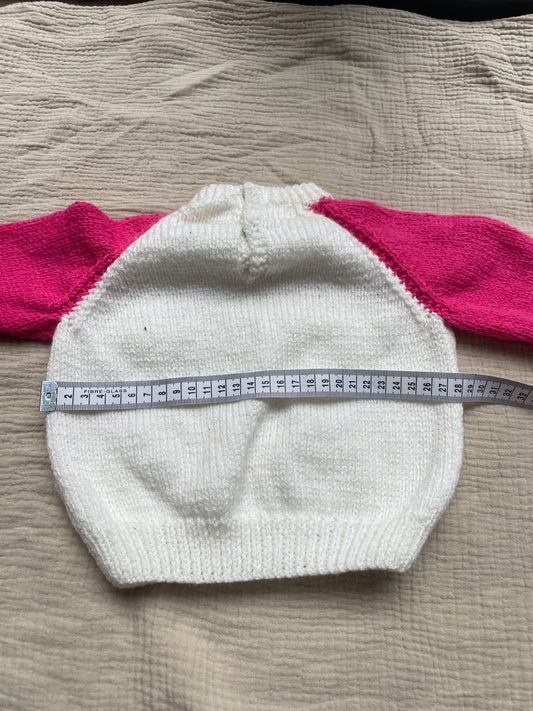 6-12m cream cardigan with hot pink sleeves
