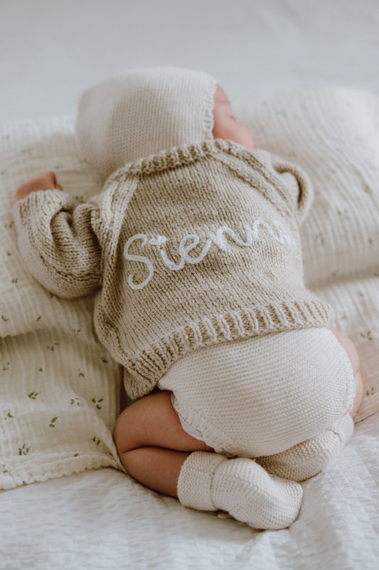Knitted to order bow personalised cardigan/jumper