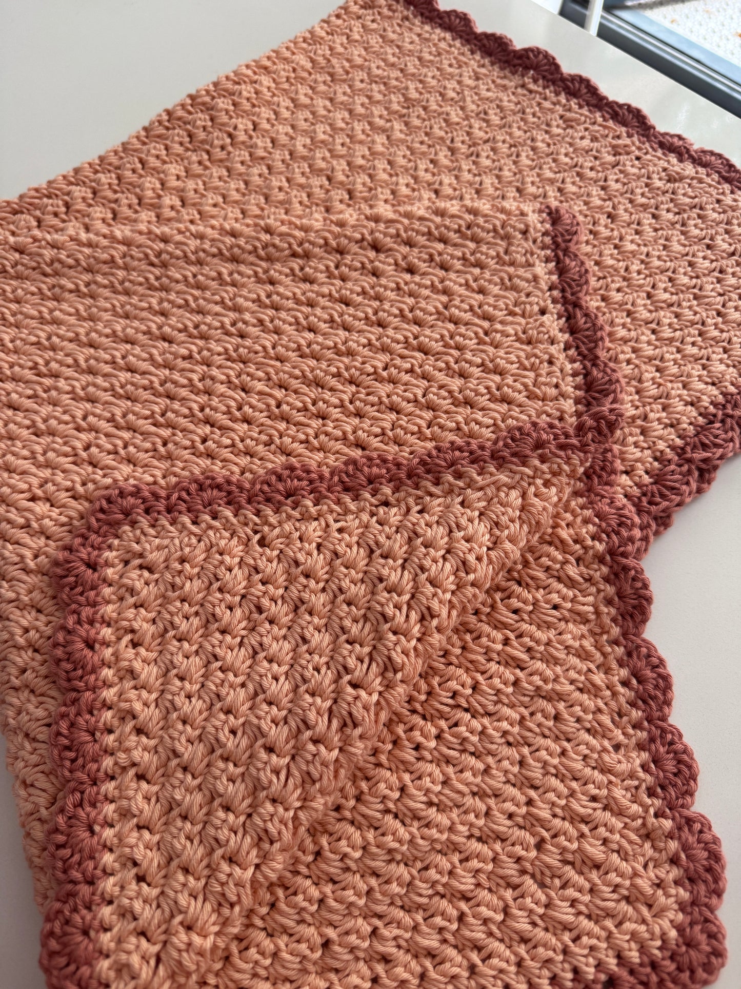 Stroller blanket hand crochet in peach shades