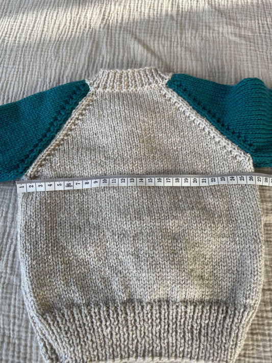 6-12m parchment cardigan with green sleeves