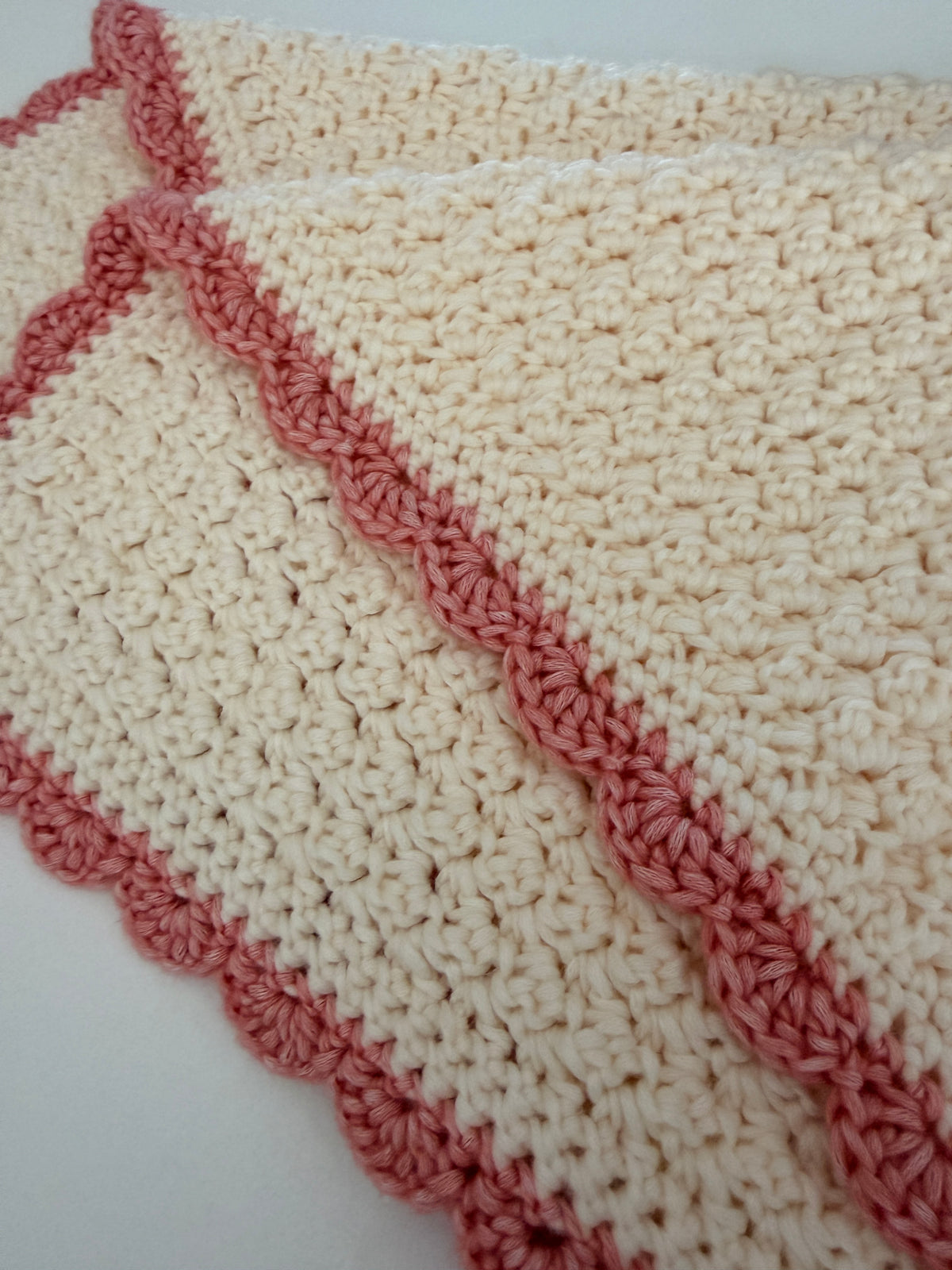 stroller blanket hand crochet in cream and coral
