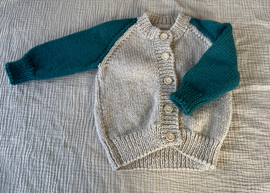 6-12m parchment cardigan with green sleeves