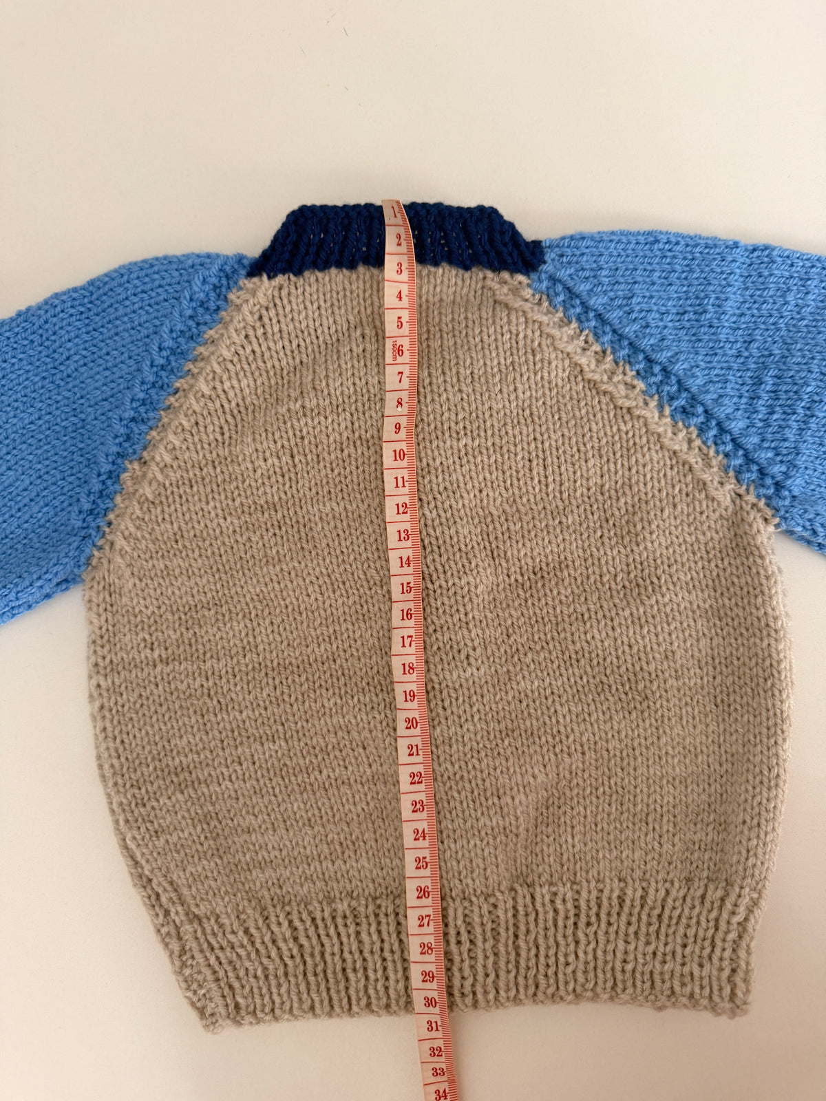 6-9 months oatmeal and blue cardigan