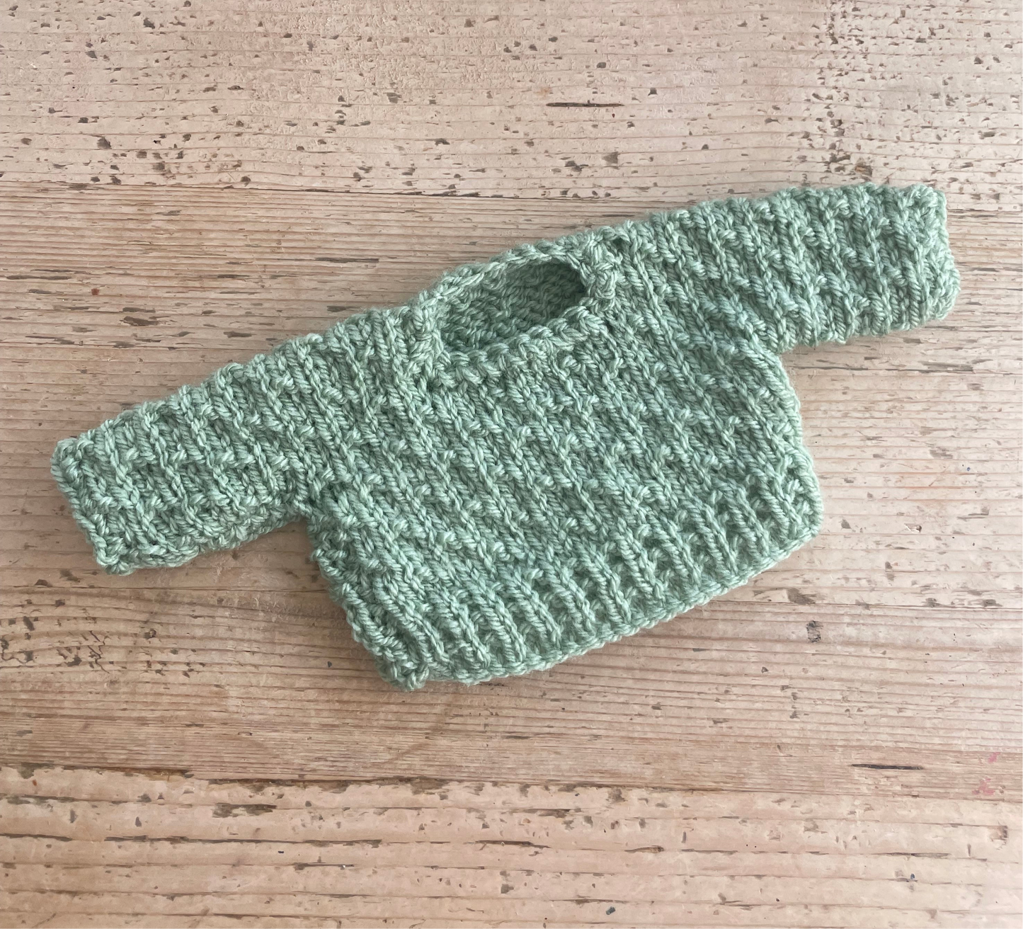 Medium jelly cat pale green jumper