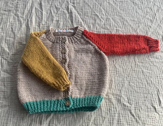 6-9 months beige cardigan with multi colour sleeves