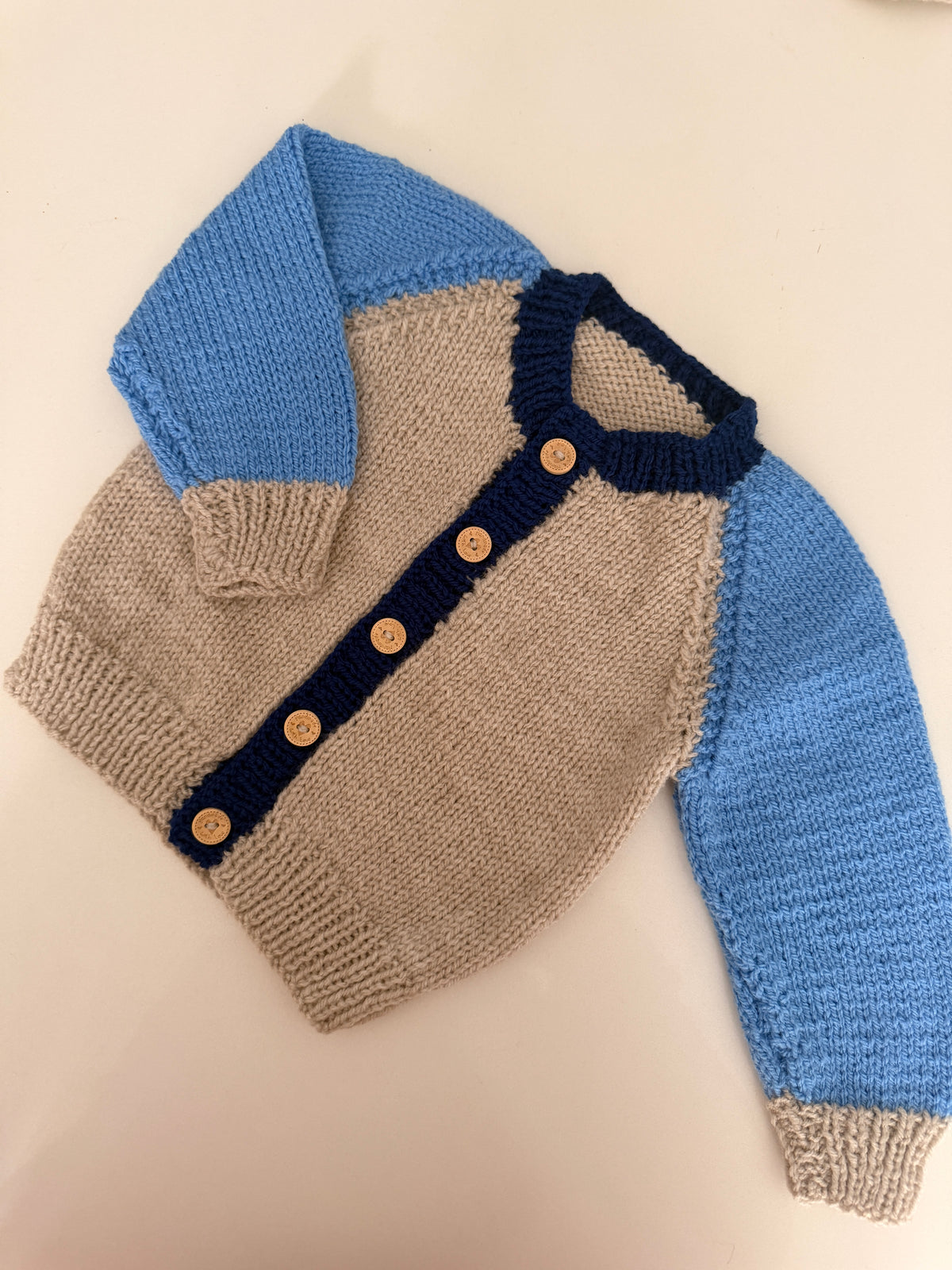 6-9 months oatmeal and blue cardigan