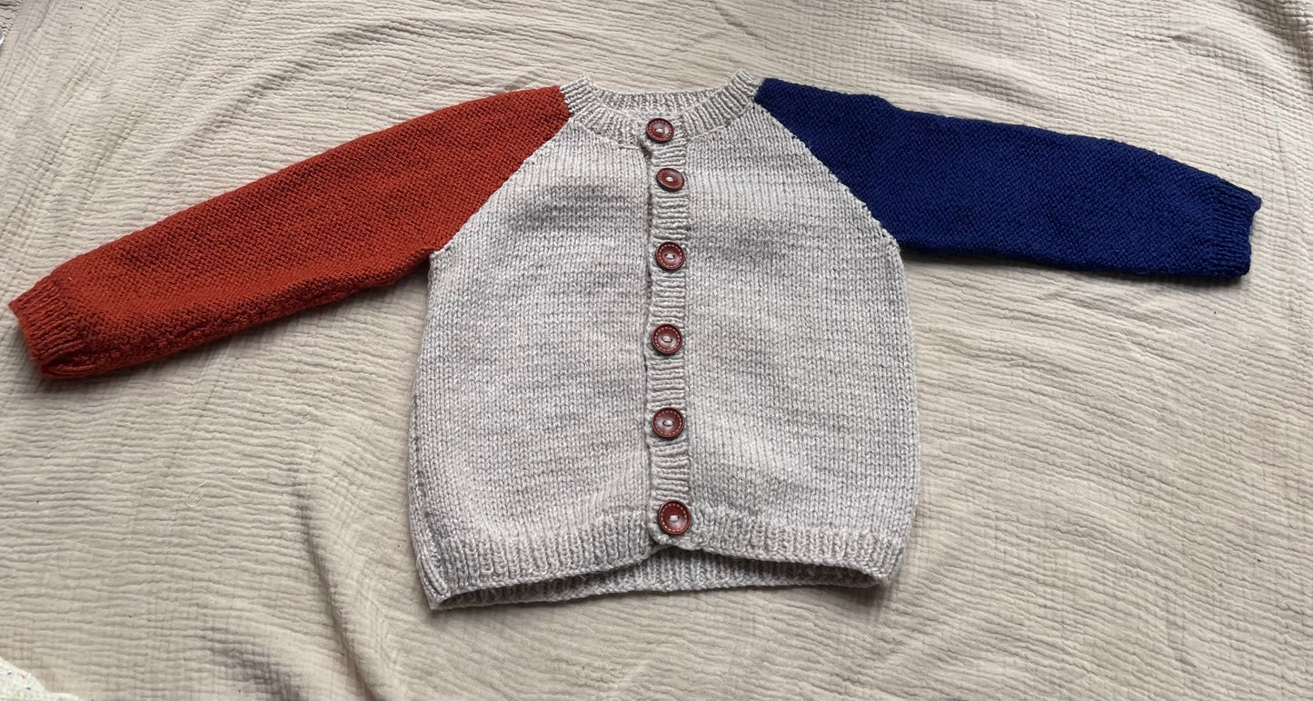 1-2 years parchment cardigan with blue and orange sleeves