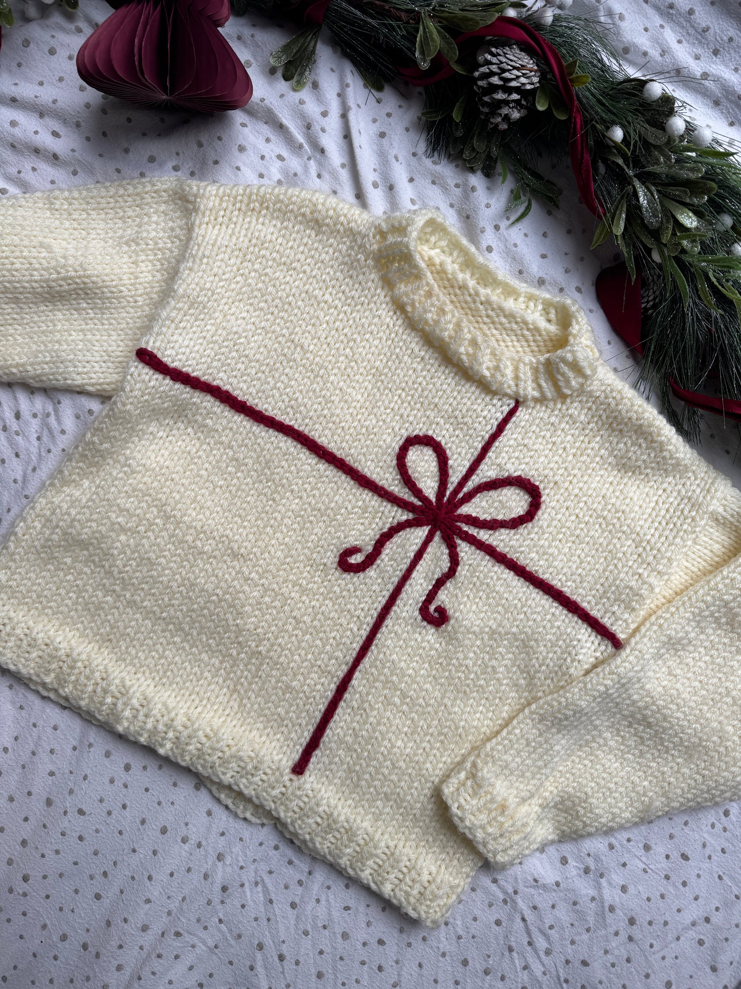 Preloved Super chunky adults size 14-16 warm cream with red present