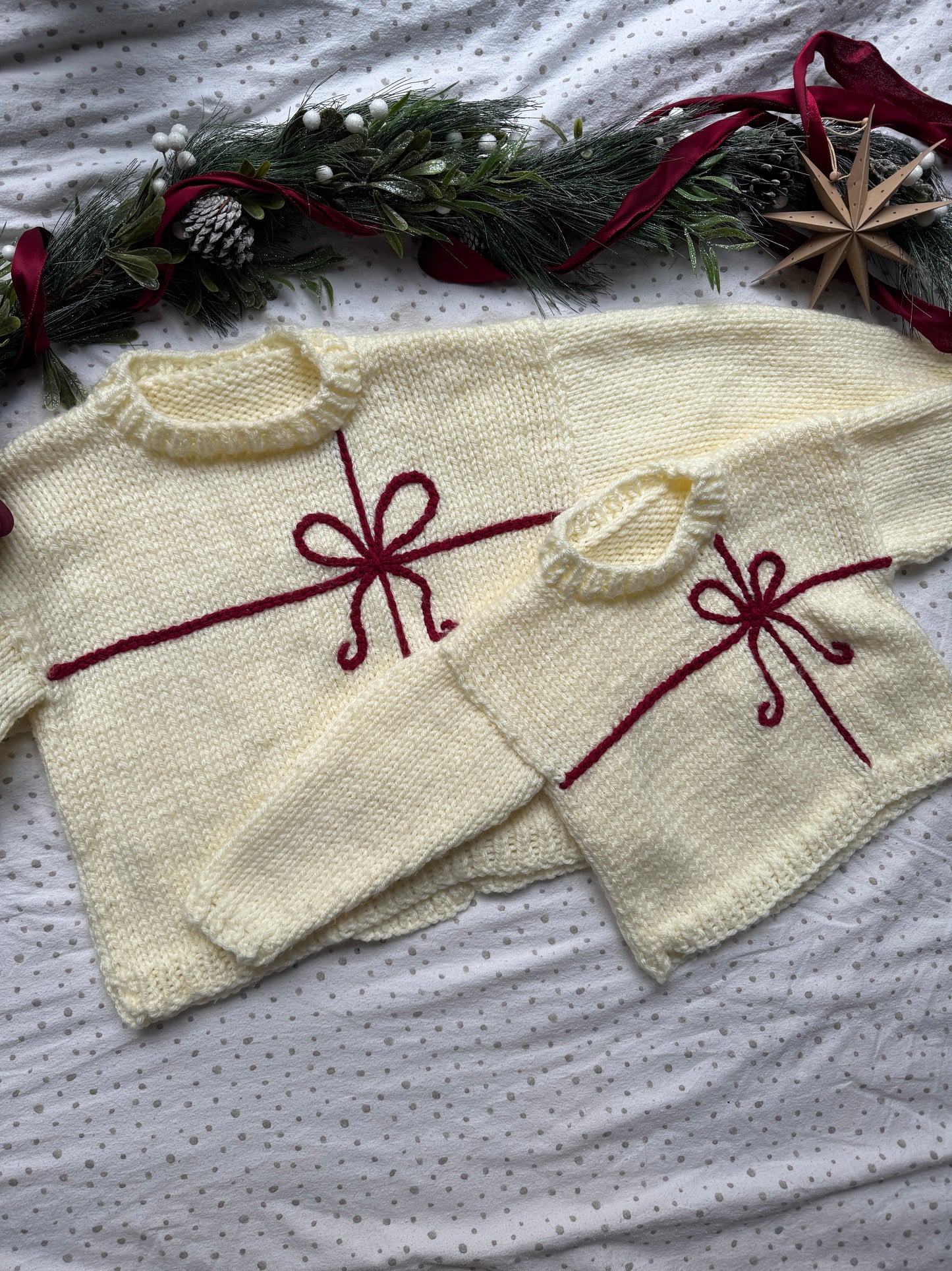 Preloved Super chunky adults size 14-16 warm cream with red present