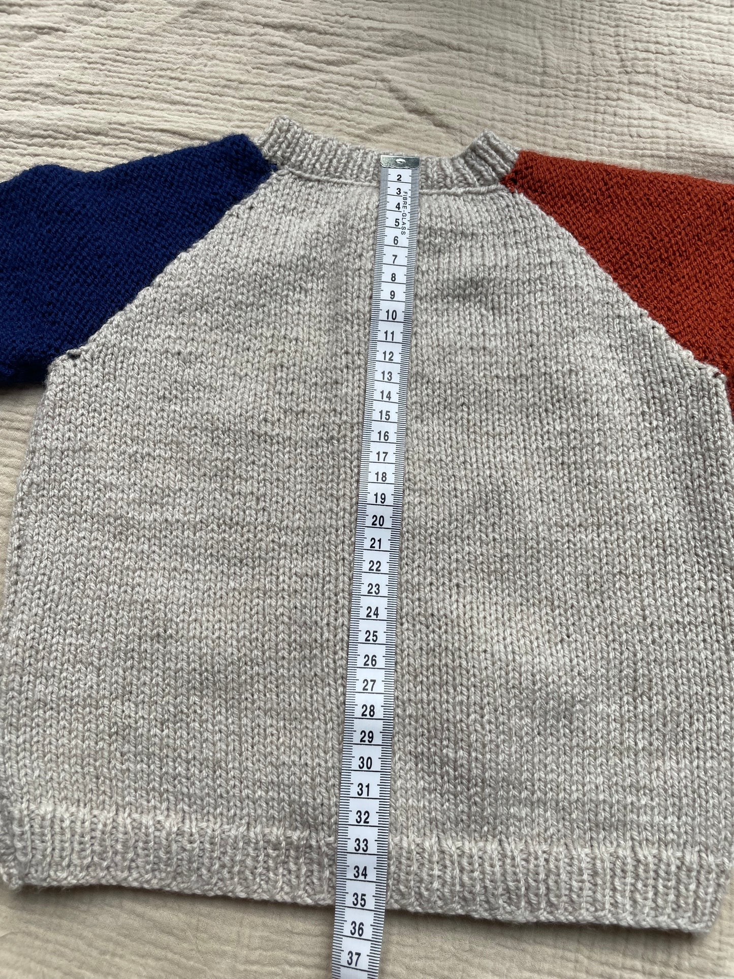 1-2 years parchment cardigan with blue and orange sleeves