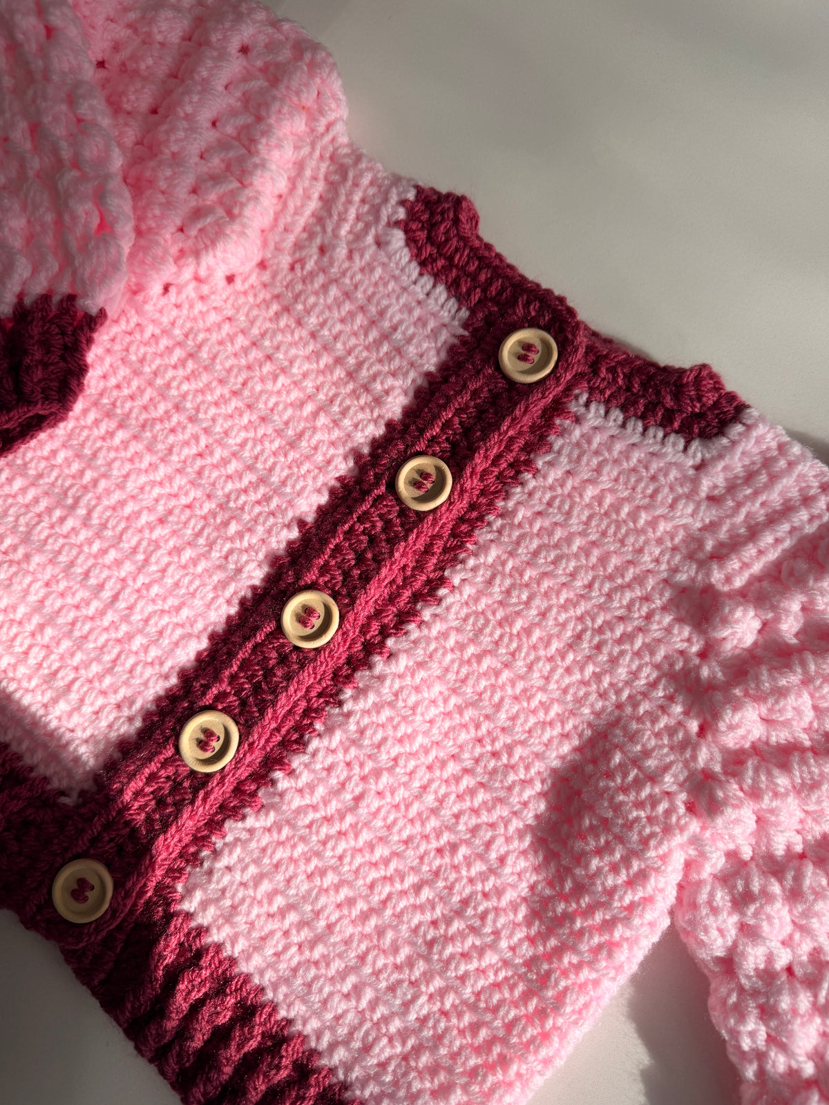 1-2 years powder and raspberry crochet Aran cardigan