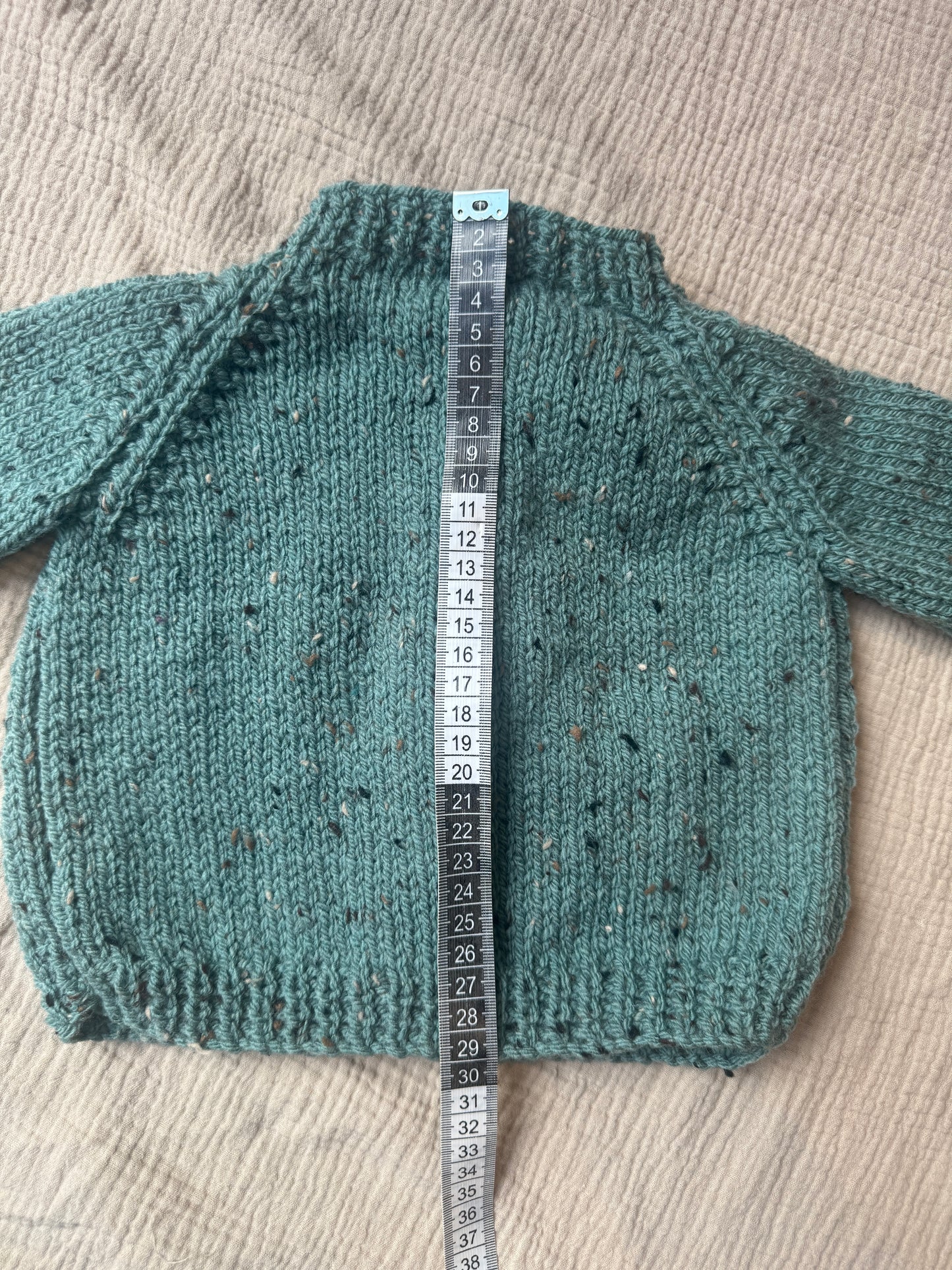 6-12months duck egg fleck Aran cardigan