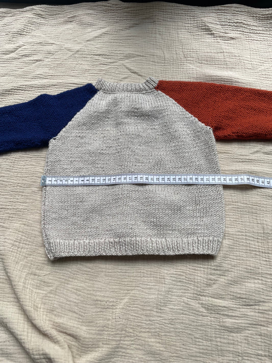 1-2 years parchment cardigan with blue and orange sleeves