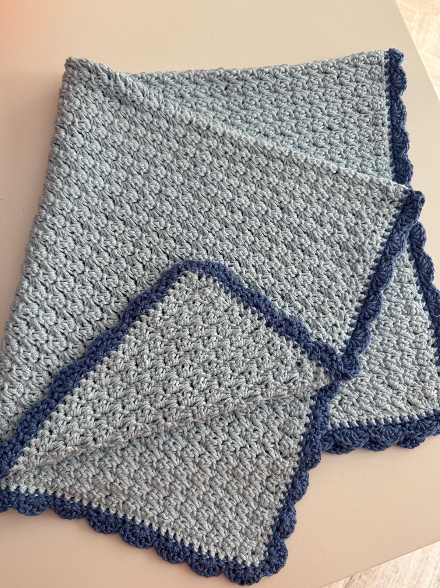Stroller blanket hand crochet in blue shades