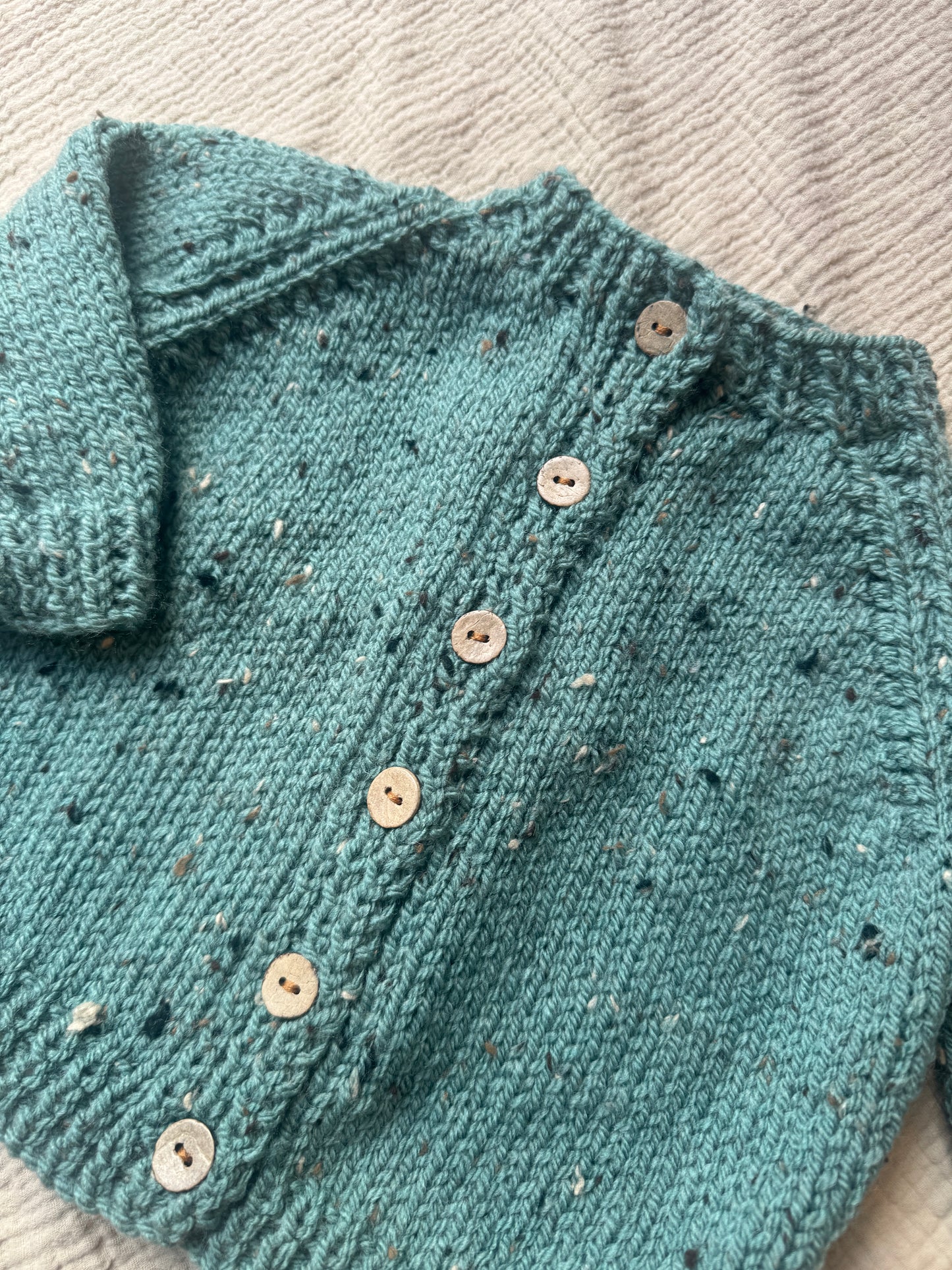 6-12months duck egg fleck Aran cardigan